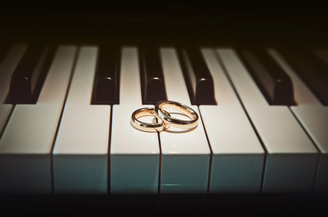 Wedding rings on piano